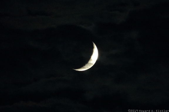 Crescent Moon In Clouds